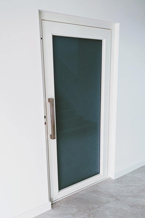 Glass doors of a Jurien Bay residential lift