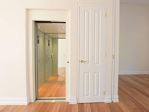 white lift with wooden floors