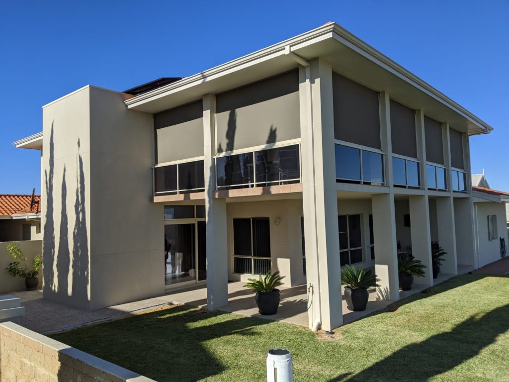 Jurien Bay house with retrofit lift shaft on the outside.