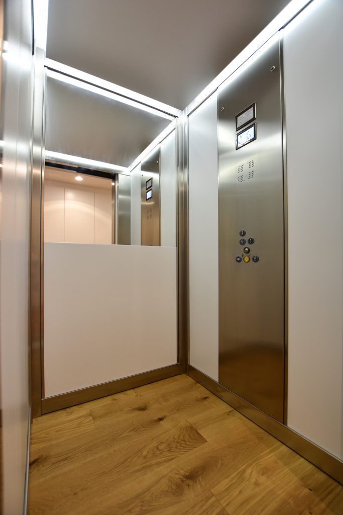 jewel residential home lift design with custom floors and mirrors