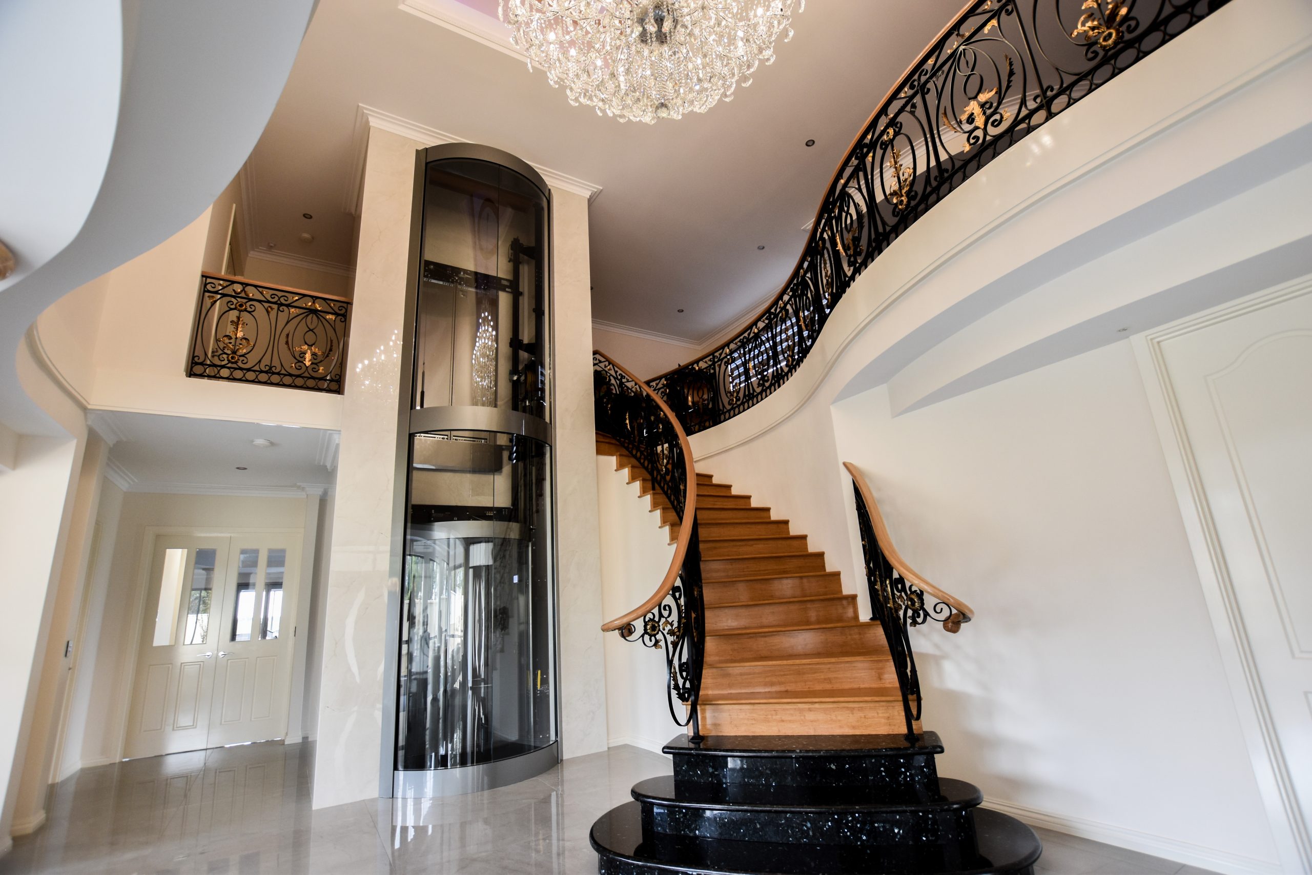Location 1 The Staircase residential lift next to stairs.