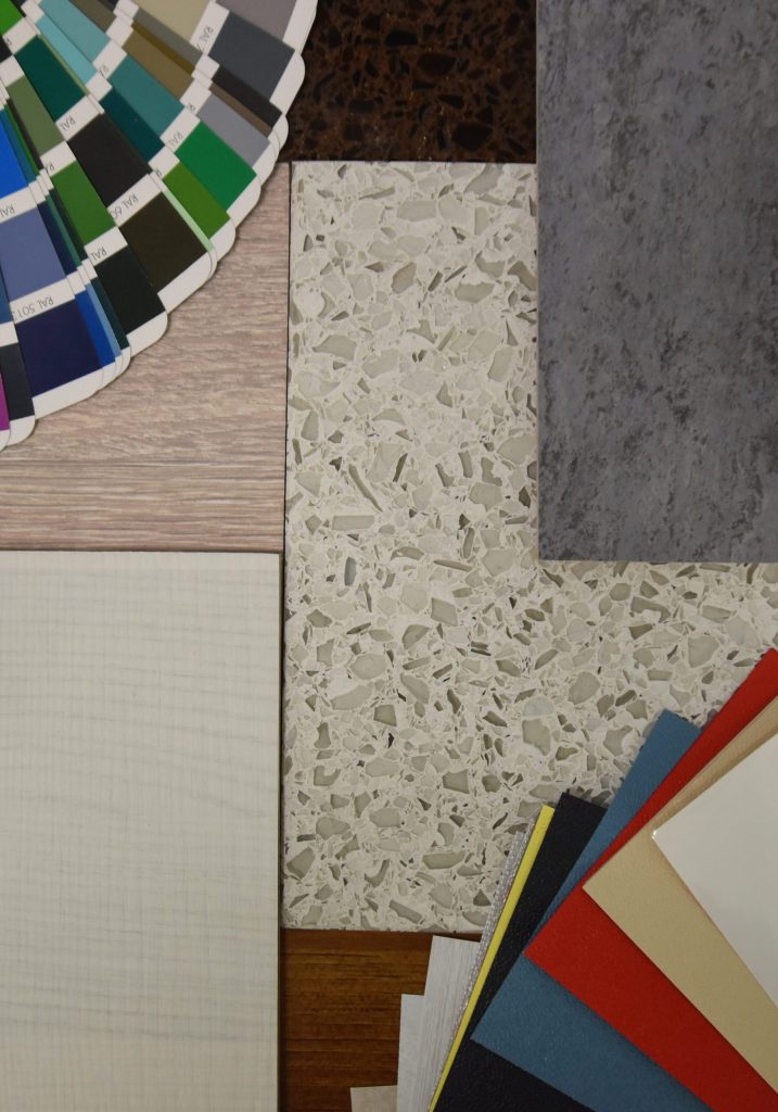 Assorted material samples with colour palettes.