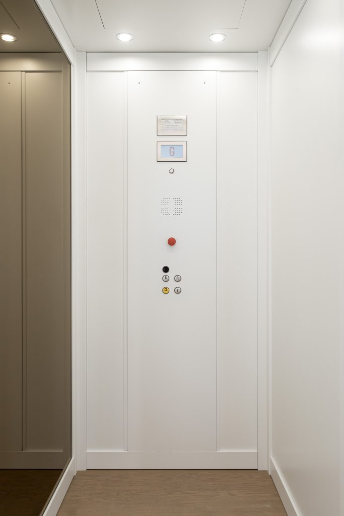 Modern home lift control panel with buttons