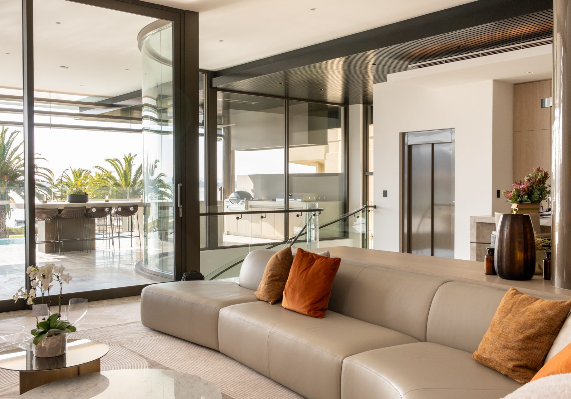 Luxurious modern living room with scenic view.