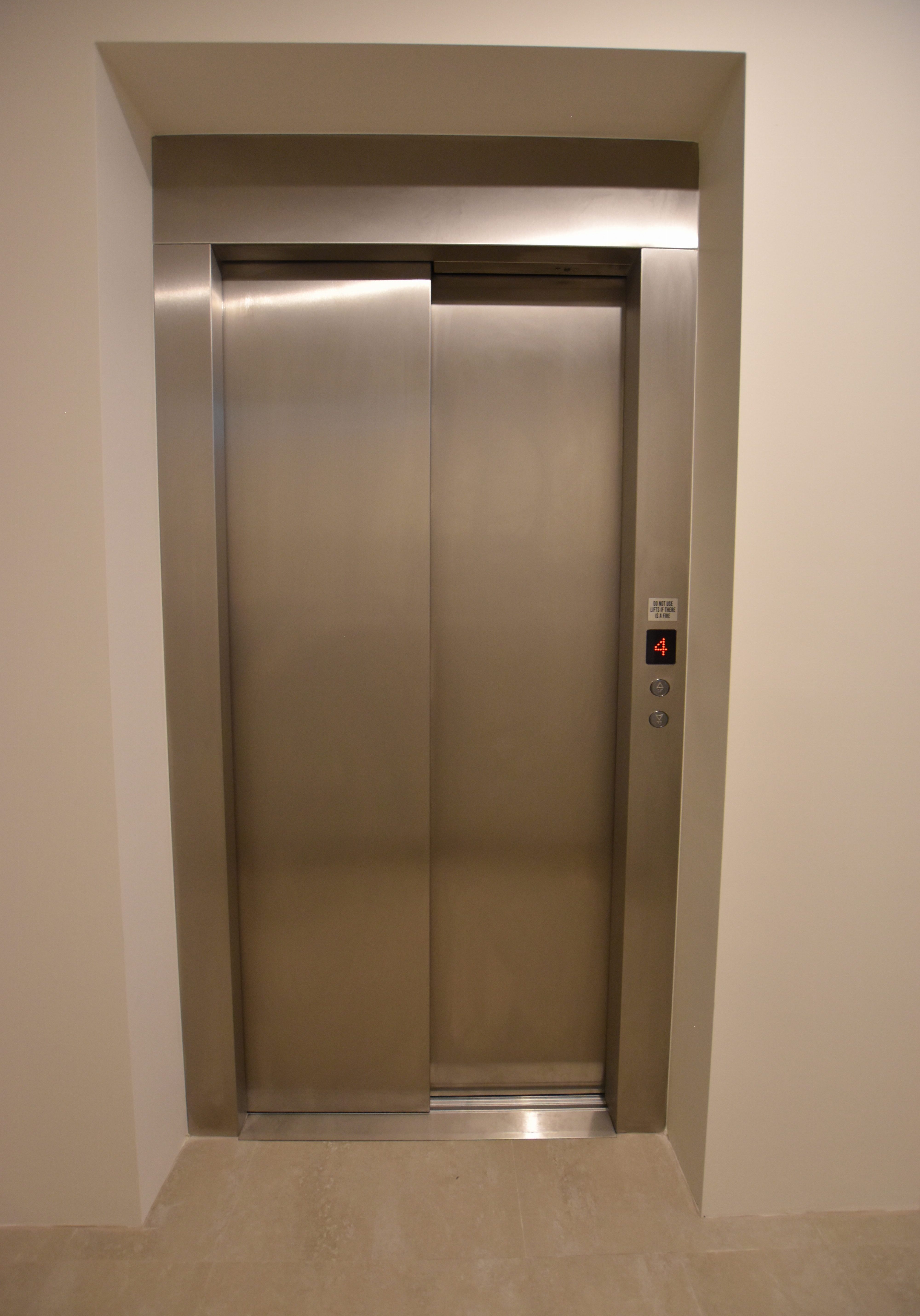 The steel door of the DDA compliant commercial lift that West Coast Elevators supplied and installed