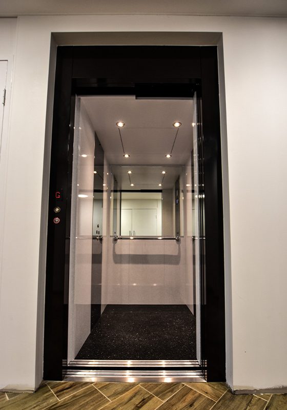 Open doors of DDA compliant commercial lift