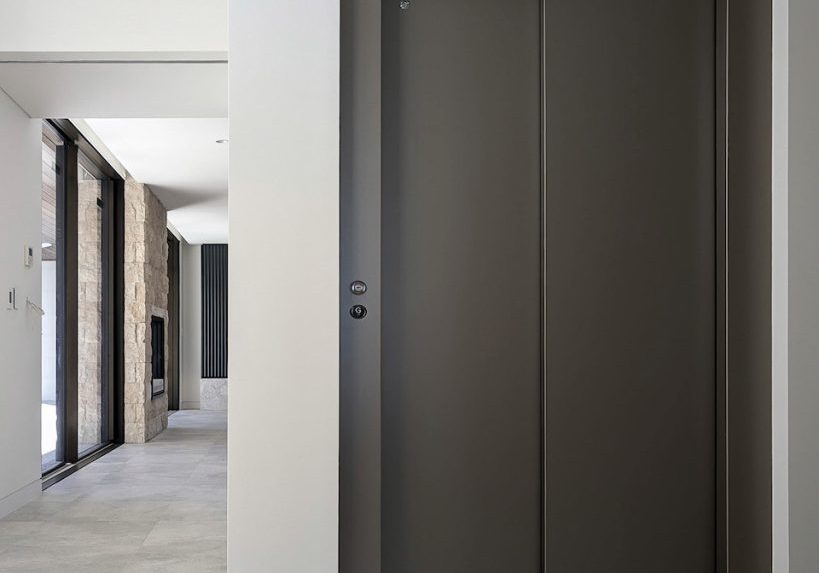 Modern elevator in minimalist home interior