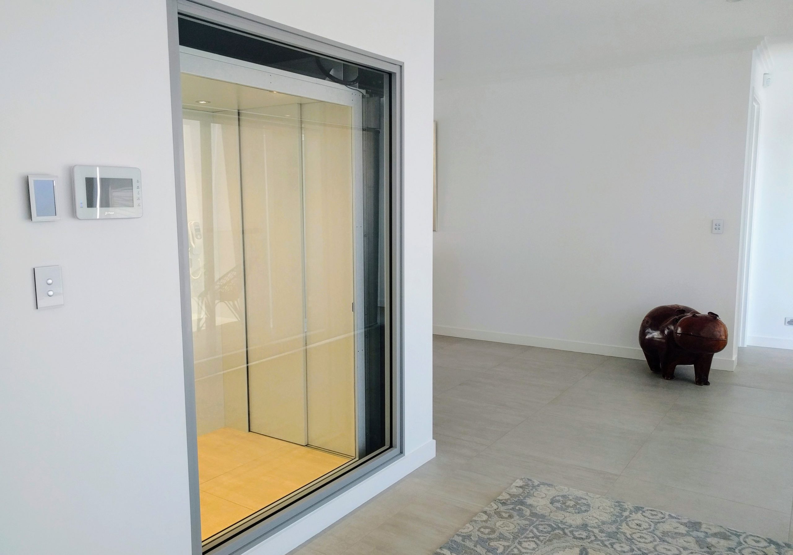Open doors of a residential lift in a Sorrento home