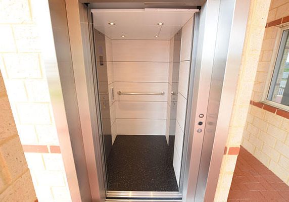 Open doors of a DDA Compliant lift in Langford