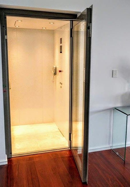 Open door of a stylish residential elevator in Melville
