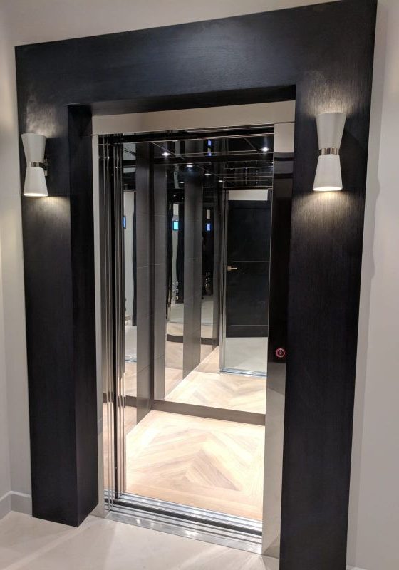 Open doors of a stylish residential lift