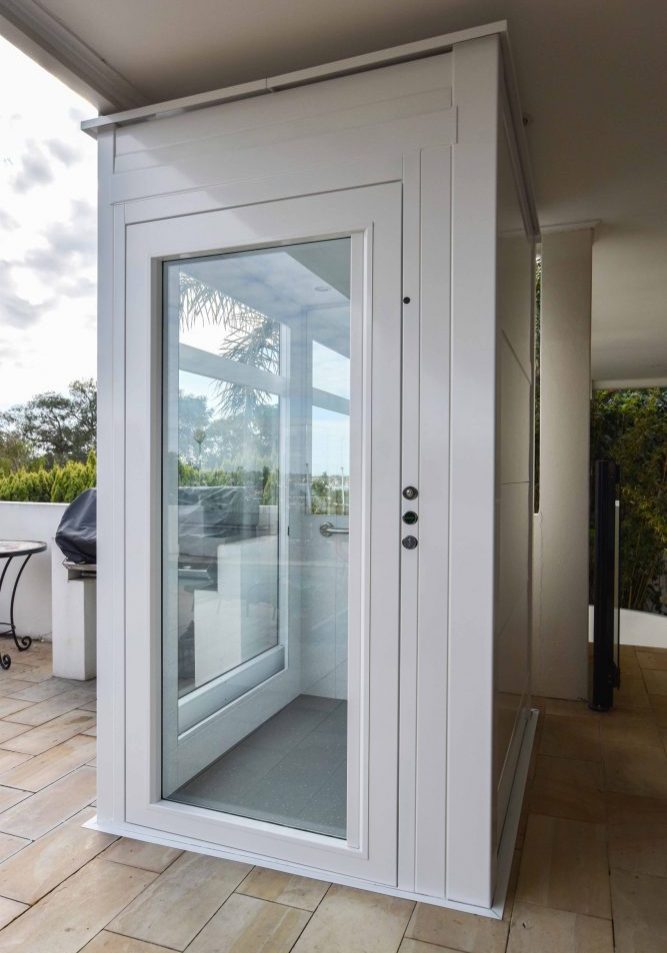 south perth residential lift with glass features