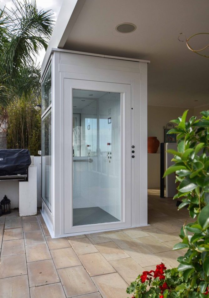 Glass door of retrofitted South Perth lift