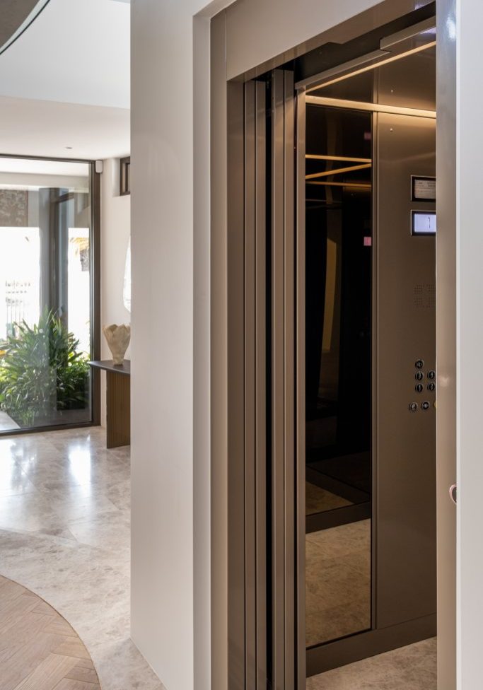 Modern home lift in stylish interior hallway