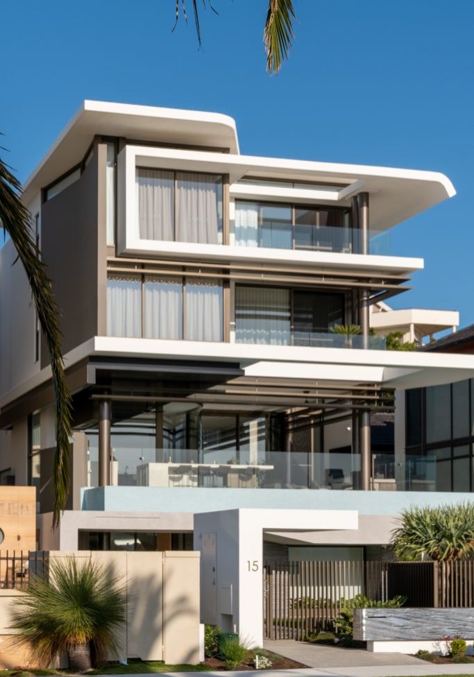 Modern three-storey home with glass balconies