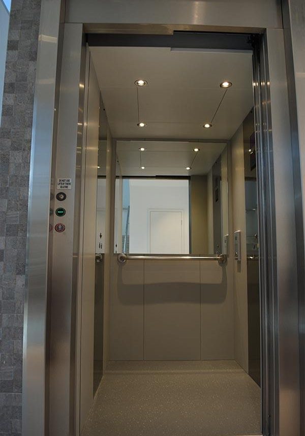 Stylish interior of a DDA compliant commercial lift in Balcatta