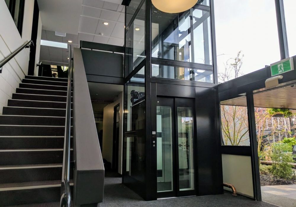 large commercial elevator installed inside a high school