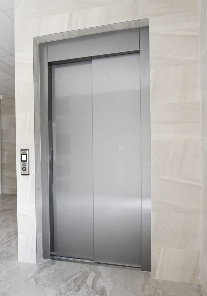 dda cabin doors in a commercial lobby.
