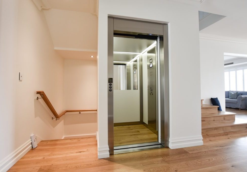 jewel home lift with custom wood floors and half height mirror