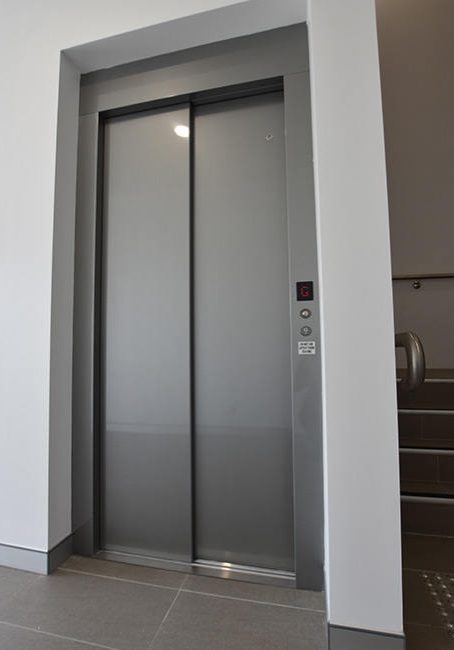 Closed doors of a DDA compliant commercial lift. Supplied and installed by West Coast Elevators