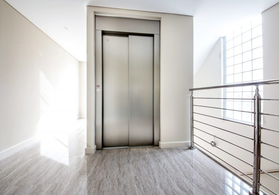 minimal stainless steel home lift