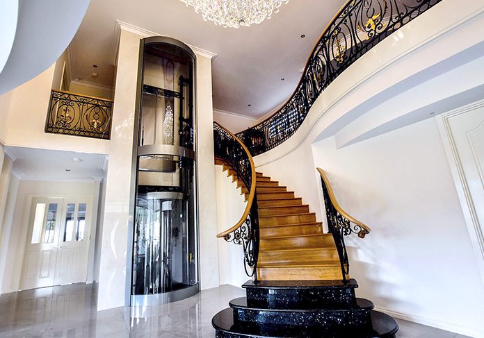 Mariginiup luxury residential round panoramic lift next to staircase