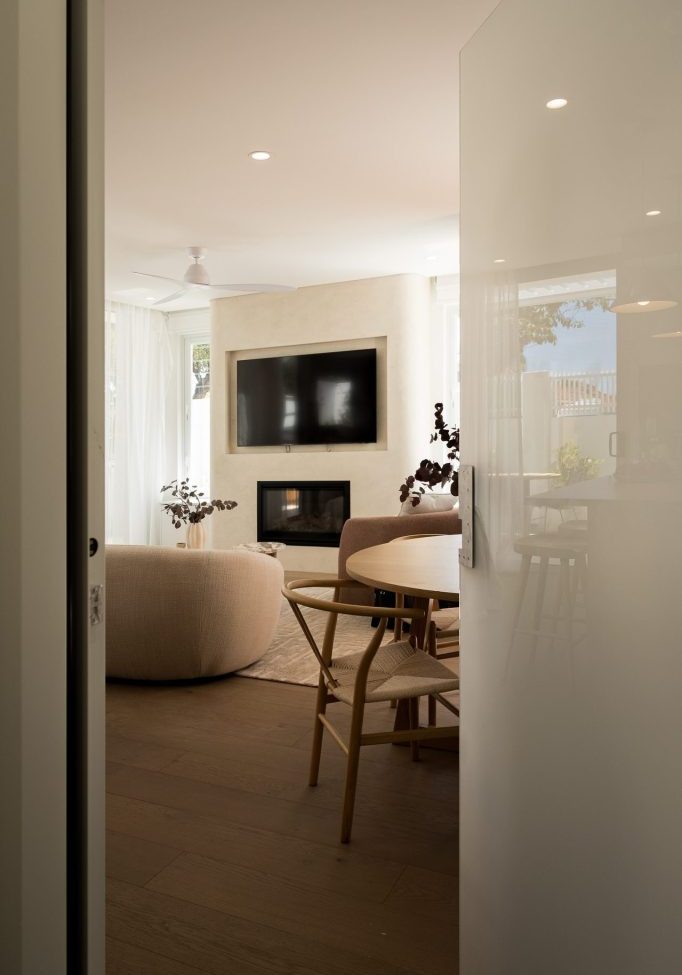 Modern living room with fireplace and wall-mounted TV
