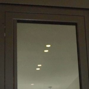 lift doors with smoked mirrored glass.
