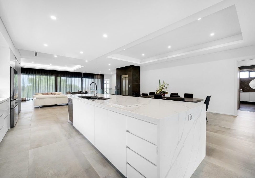 beautiful kitchen with a white breakfast bar