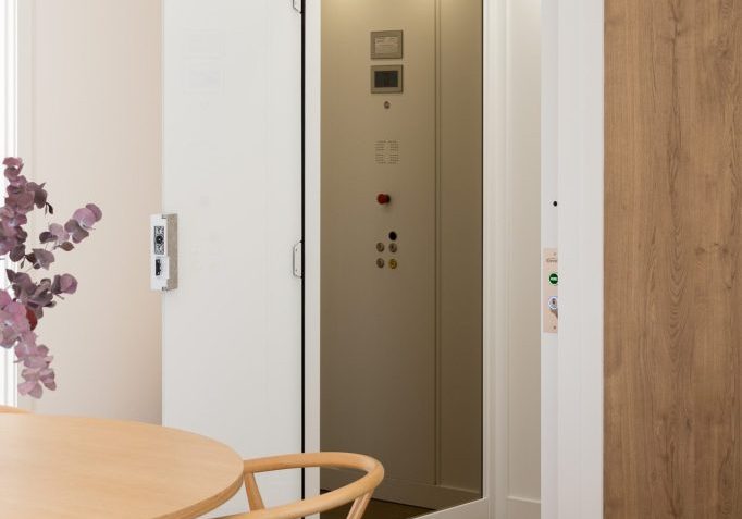 Compact home lift installed in modern interior