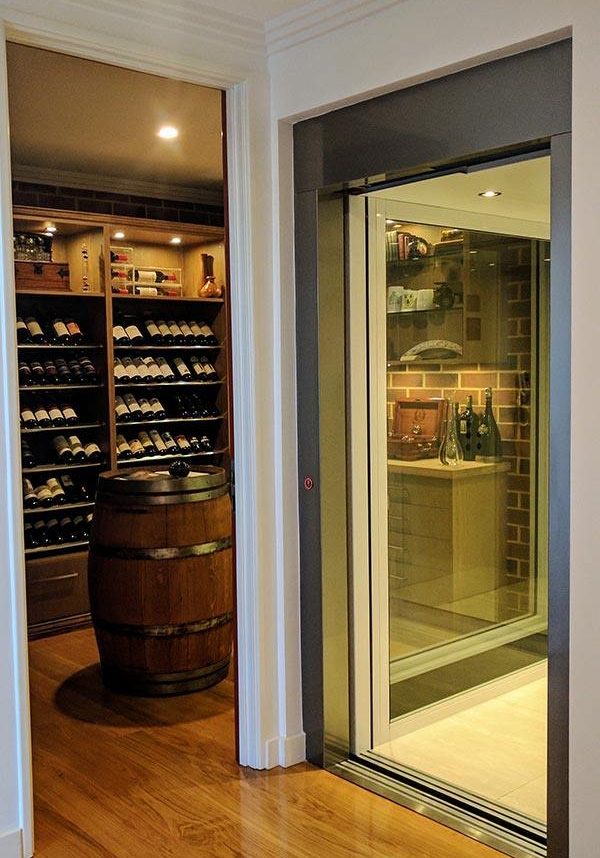 Glass walls on a residential lift in a cellar